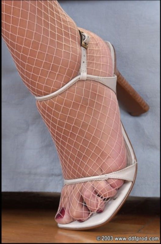 Ступни женски ног в колготах